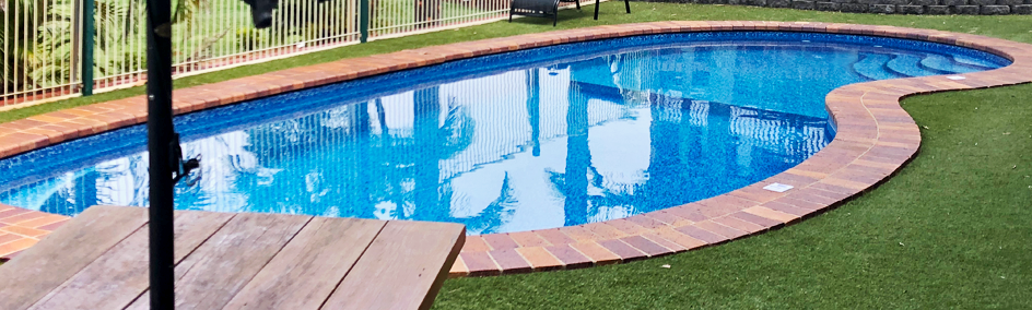 Relax by the pool at Bribie Island Waterways Motel